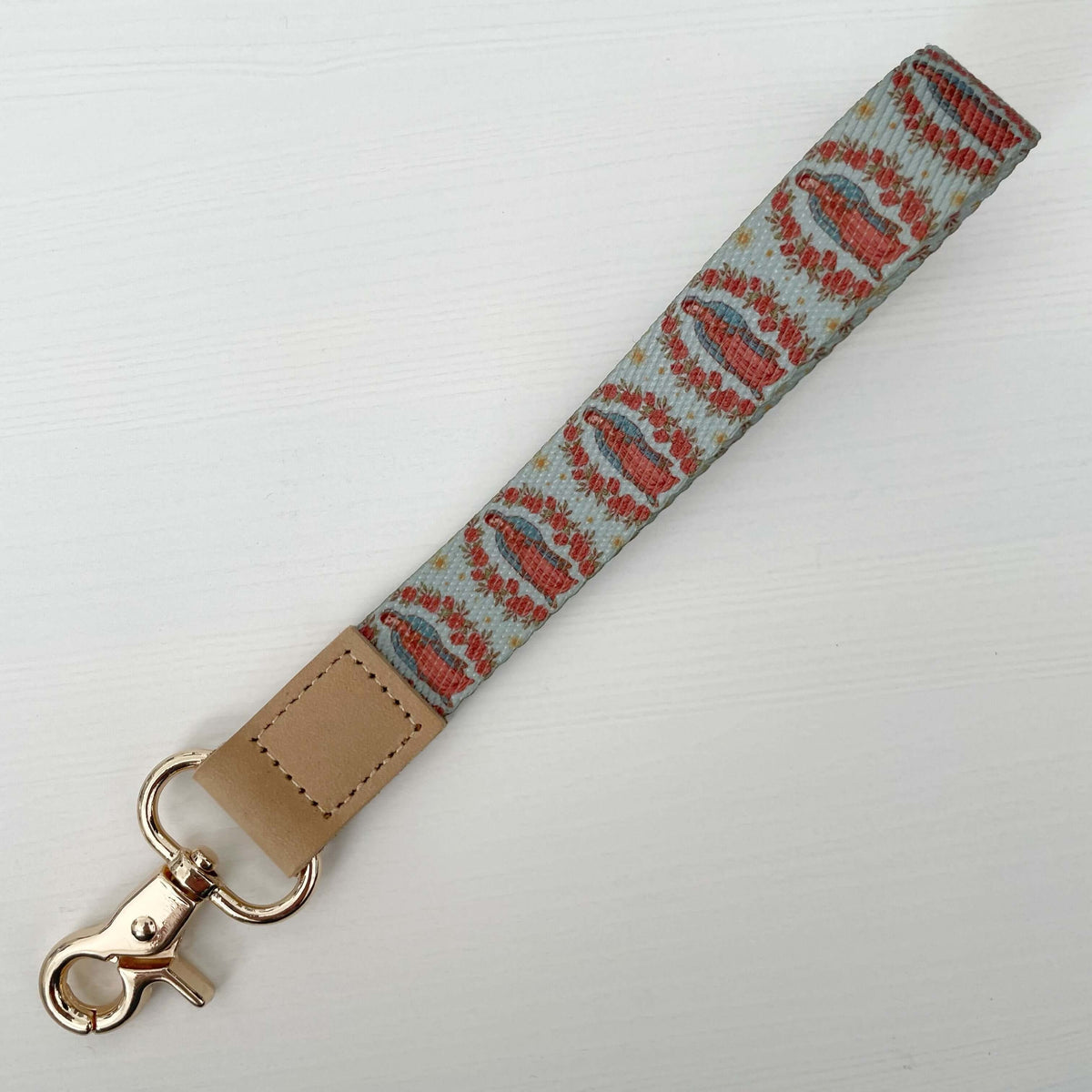 Catholic lanyard from Guadalupe Collection with colorful geometric pattern, perfect blend of faith and function for everyday wear.