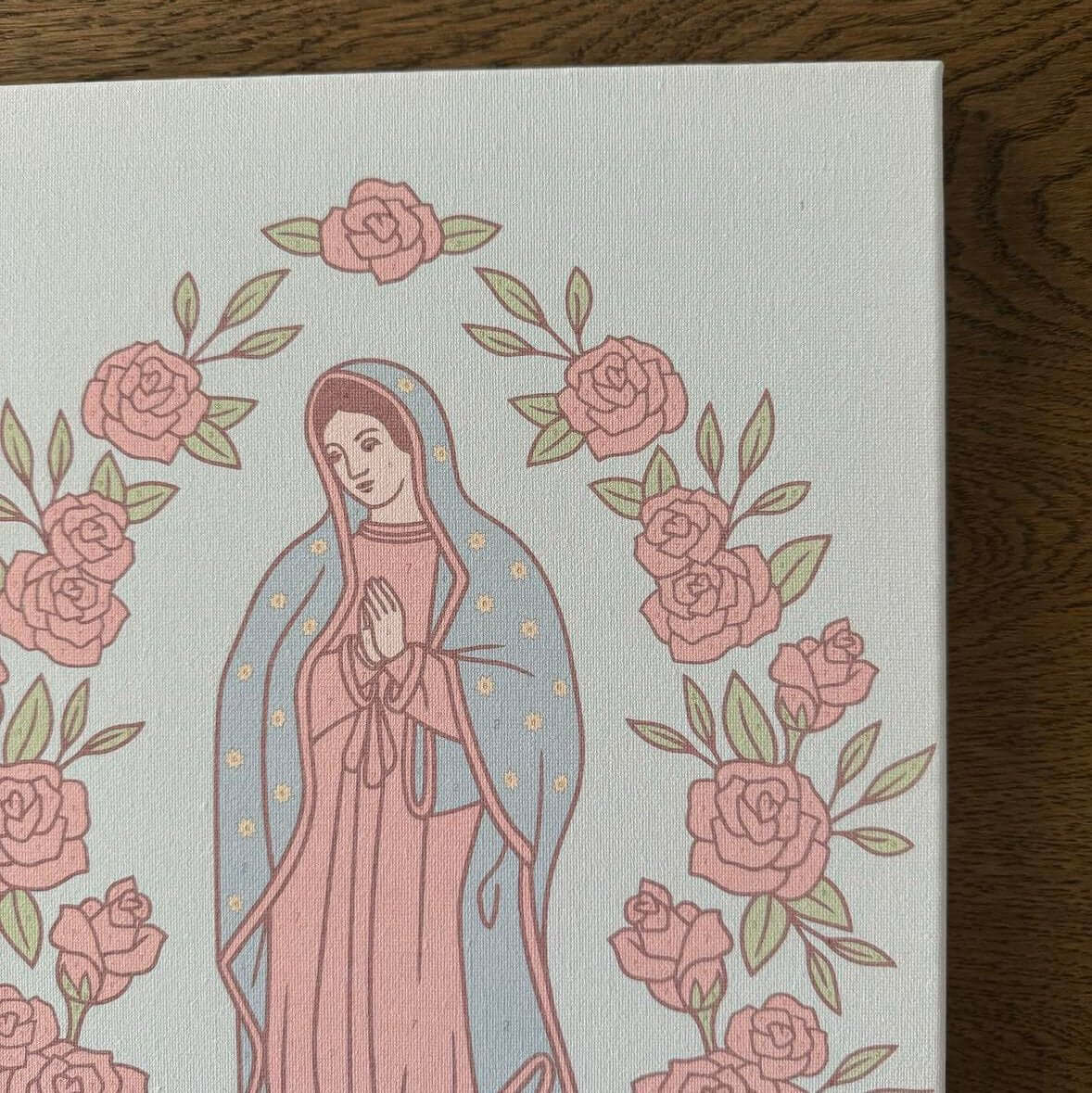 Our Lady of Guadalupe paint by number kit canvas showing a serene image surrounded by pink roses.