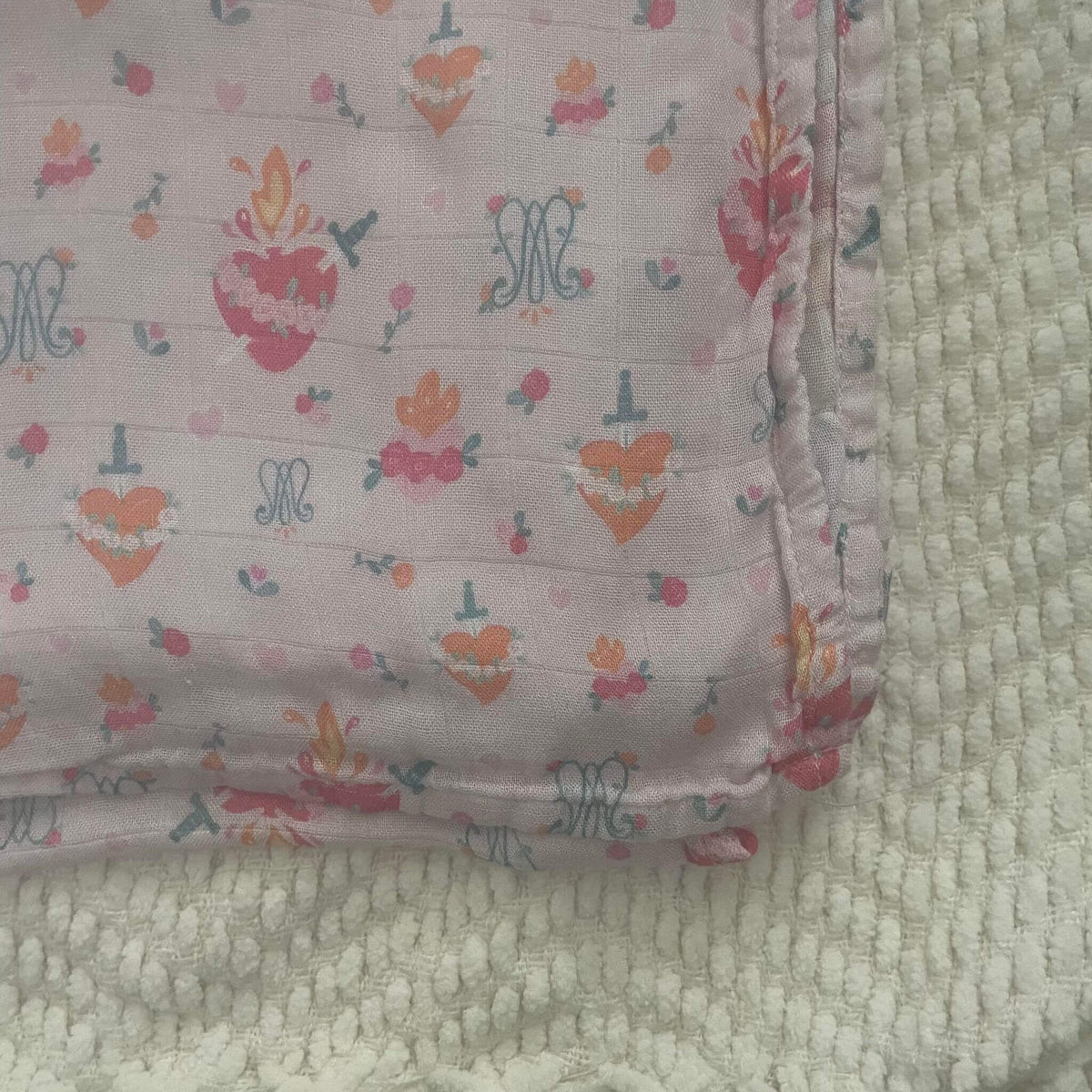 Auspice Maria Catholic Swaddle Blanket with Holy Hearts pattern, made from soft organic bamboo cotton, ideal for infants.