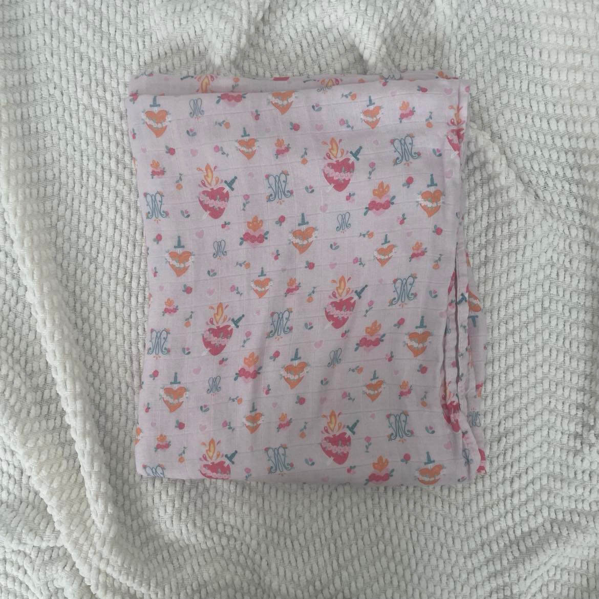 Auspice Maria Swaddle Blanket with faith-inspired pattern, made from organic bamboo cotton, 47x47 inches, ideal for babies.
