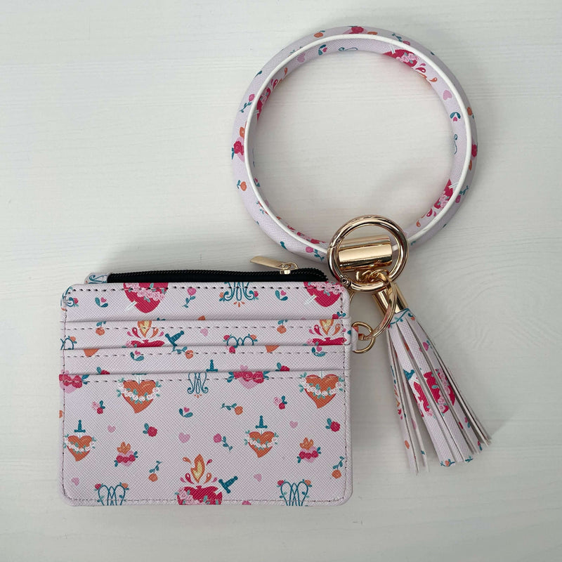 Auspice Maria Collection Catholic ID Wallet with floral and religious motifs, faux leather, keyring loop, and tassel design.