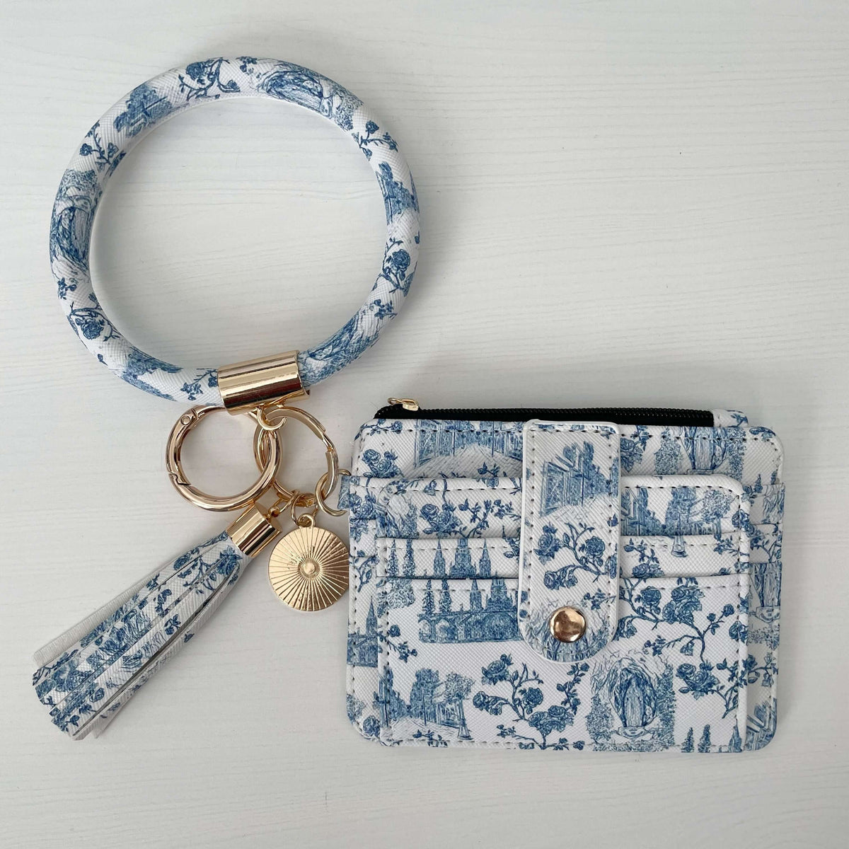 Catholic I.D. Wallet - Lourdes Collection with blue patterned faux leather, keyring, and tassel. Stylish and functional accessory.