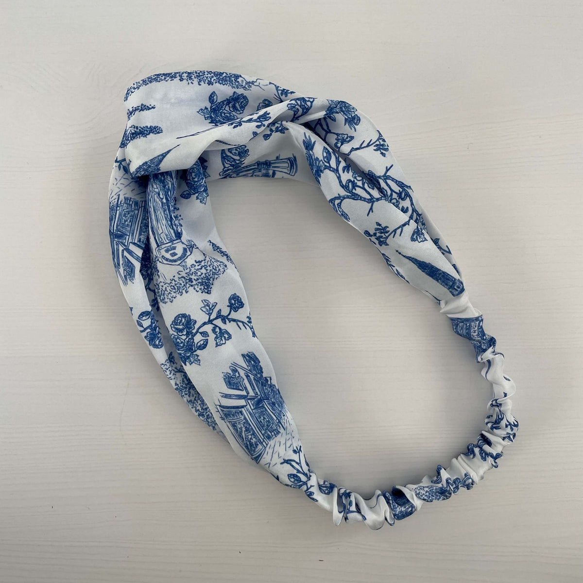 Catholic Satin Headband from Lourdes Collection featuring blue and white divine patterns, combining faith with fashion.