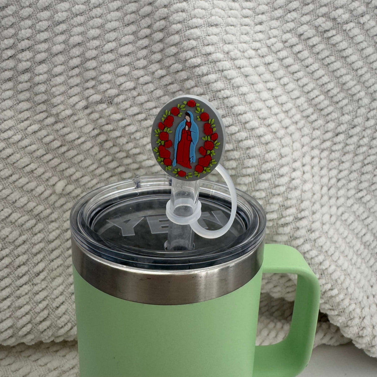 Catholic straw topper with Our Lady of Guadalupe design on a green tumbler, ideal faith-inspired accessory.