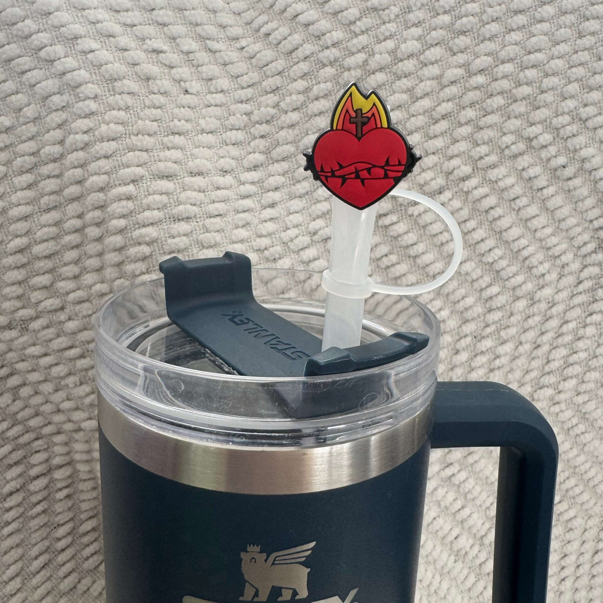 Sacred Heart straw topper on a tumbler, part of the Catholic Straw Topper Set for daily faith reminders.