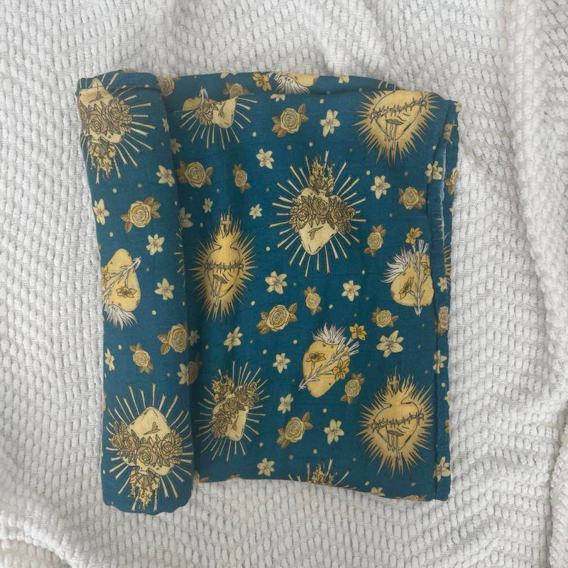Holy Hearts swaddle blanket with religious motifs on soft organic bamboo cotton, 47x47 inches, spiritual baby wrap.