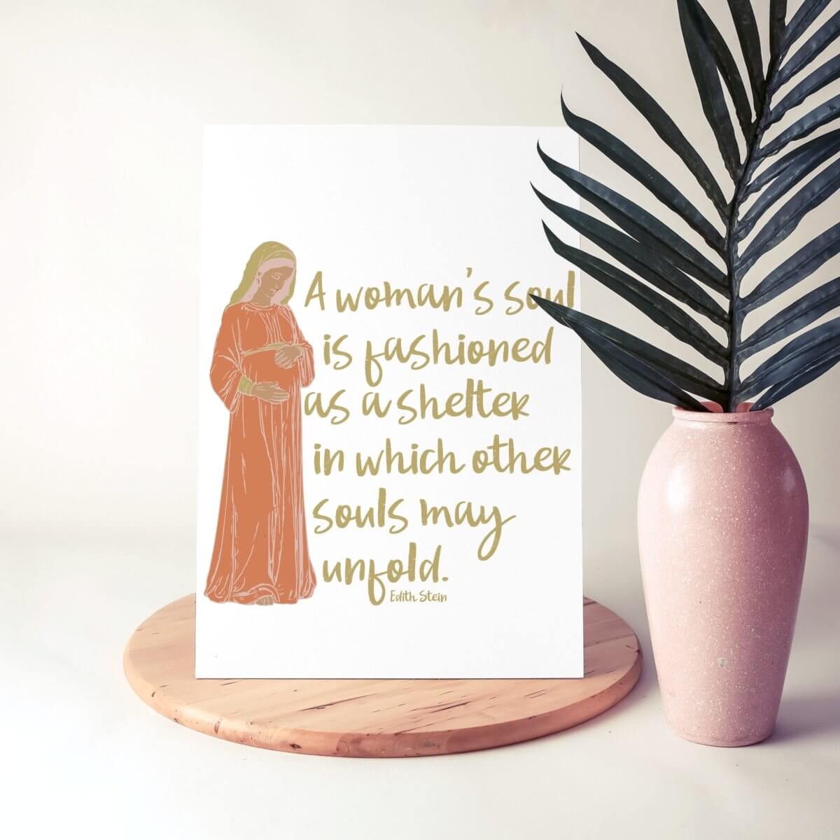 Printable quote art featuring St. Edith Stein's words, 'A woman's soul is fashioned as a shelter,' with decorative plant and modern styling.
