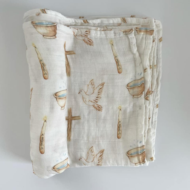 Baptism swaddle blanket with dove, cross, and candle design for baby’s holy sacrament.